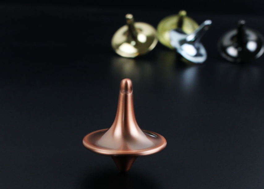 Hot sale gold color spining top,world famous metal spinning top for toy