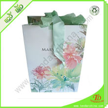 paper bag a4 size with slik ribon closure for shopping and gift packing, made of various paper