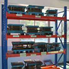 Multi-layer bolted shelving rack for warehouse