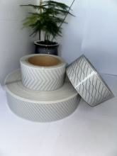 Laser-engraved bright silver hot melt adhesive film