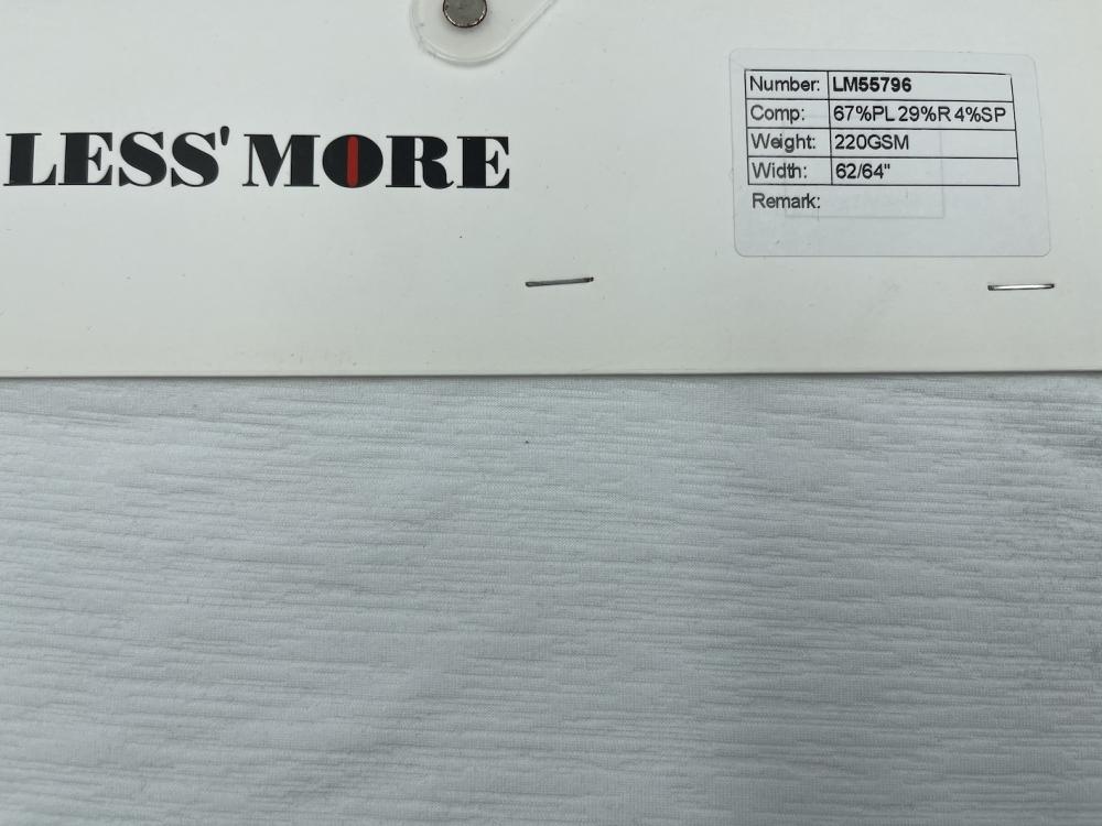 Tissu texturé 67% polyester 29% rayonne 4% élasthanne