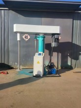 Mixing and dispersing machine