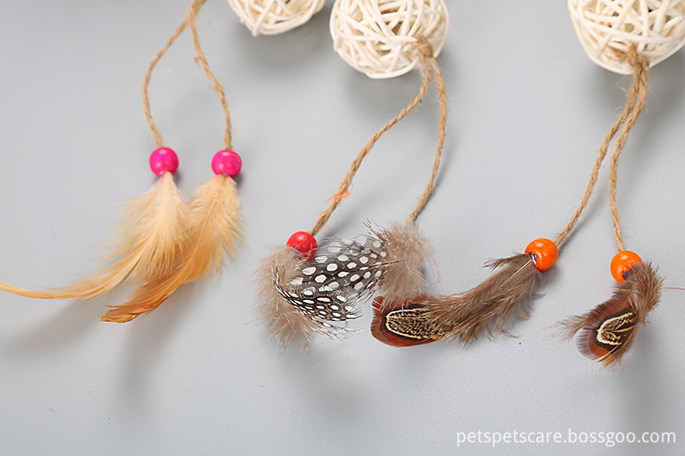 natural color hollow rattan ball with feather cat ball toy