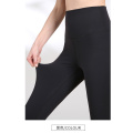 Leggings da yoga fitness asciutti che assorbono l&#39;umidità