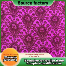 Paisley pattern on wine red base