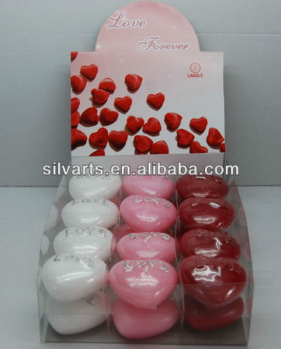 heart shape candle in shrink wrap