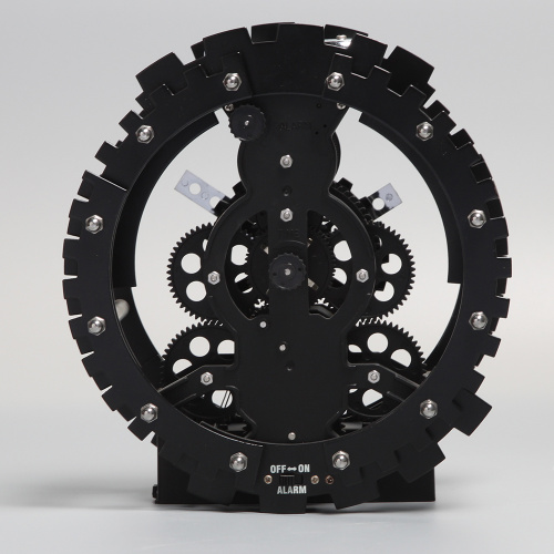 Black Round Gear Alarm Clock With A Pedestal