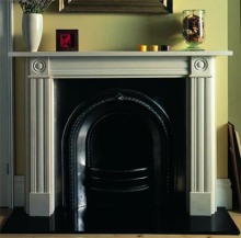 Georgian Bullseye Carved Stone Fireplace