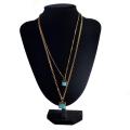 Collier double couche en or avec pendentif carré turquoise