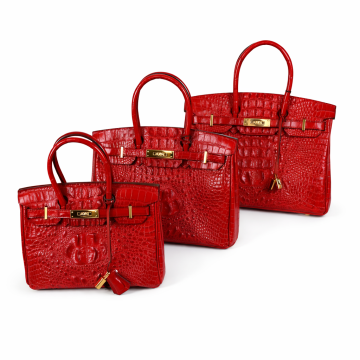 Luxurious crocodile skin embossed glossy leather handbag