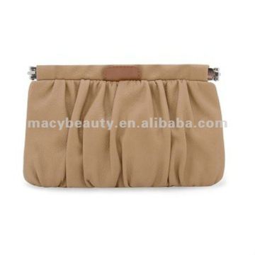 Ruched cosmetic bag with metallic snap frame fastening
