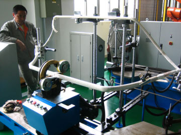 Motor coil taping machine