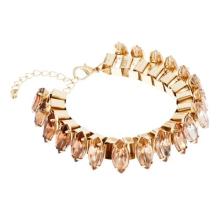 Eye-shaped diamond gold charm bracelet