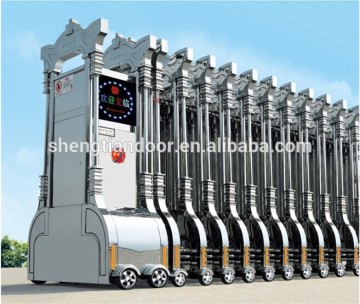 Automatic folding gate