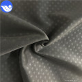 Tissu 100% polyester en relief Super Poly coloré