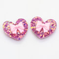 100 Uds corazón Bowknot en forma de cabujón de resina cuentas traseras planas Slime niñas accesorios para el cabello DIY juguete decoración encantos