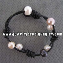 Wax cord bracelet with beautiful pearls