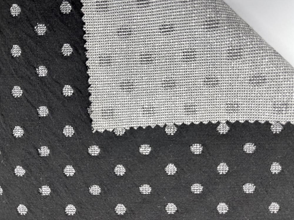 Tissu jacquard 85% polyester 13% lurex 2% élasthanne