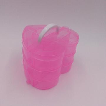 boîte de rangement en plastique rose en forme de cœur