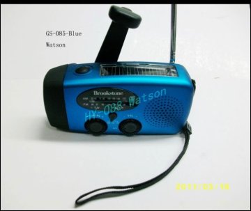 Portable radio with LED flashlight