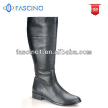 Black patent leather flat boots