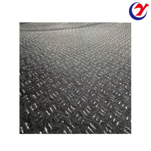 Plastic-coated non-woven fabric