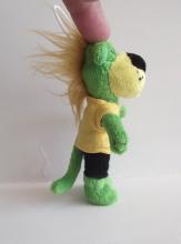 Green bear key chain wearing clothes