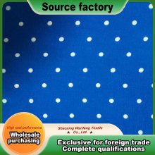 Large white dots on blue background