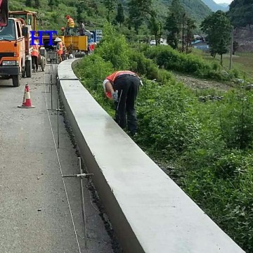 2016 Advanced Slipforming Curb Machine