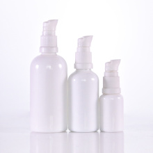 Opal white glass bottle with white lotion pump