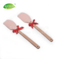 Spatule à beurre de silicone avec manche en bois caoutchouc