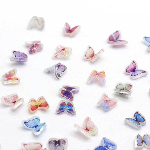 Hot Fashion 100Pcs / Tasche Harz Nagel Schmetterling 3D Maniküre Kunst Aufkleber Schmetterling Charme 8MM 3D Harz Schmetterling Nail Art Dekorationen