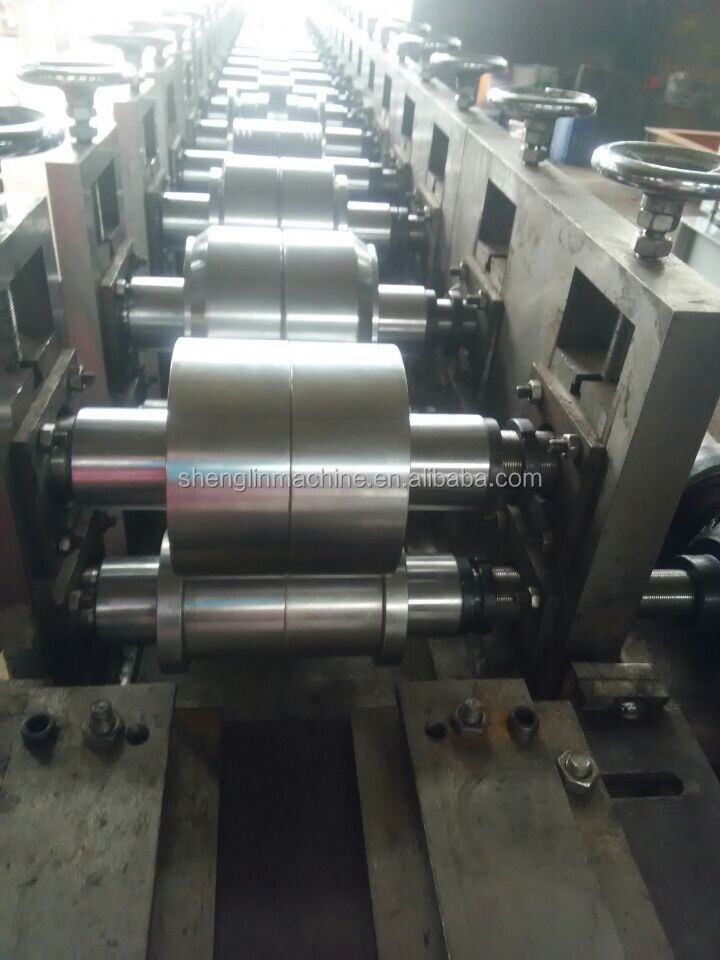 roller shutter slats door roll forming machine with punching device