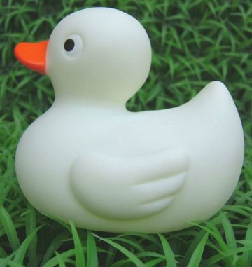 White rubber duck with pink heart