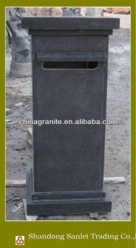 carved stone mailbox