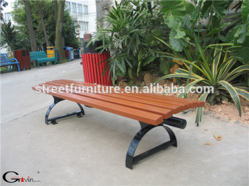 Outdoor wooden backless bench with metal legs