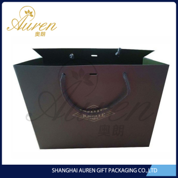 environment freindly Retail art paper gift bag with die cut handle