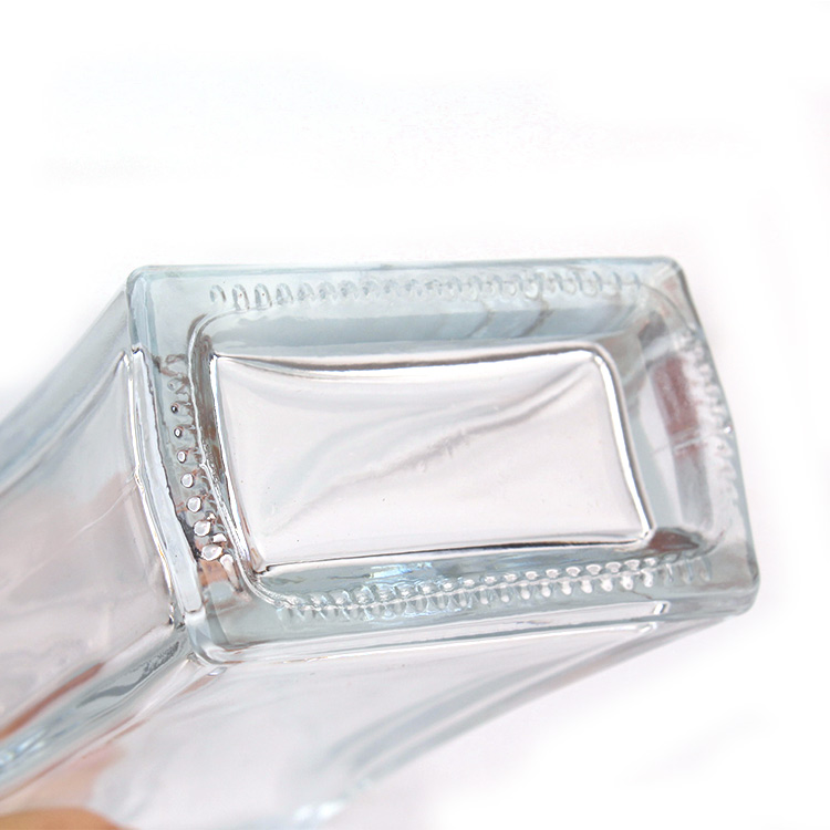 Custom Empty 100ml clear square refillable perfume oil glass spray bottle with sprayer