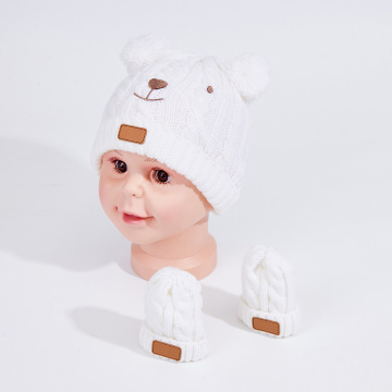 Baby's winter knitted beanie and gloves set