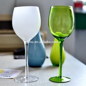 Hand blown solid green colour drinkware and white colour drinking glass