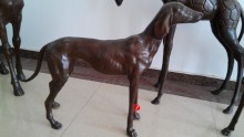 walking cast bronze dog statues