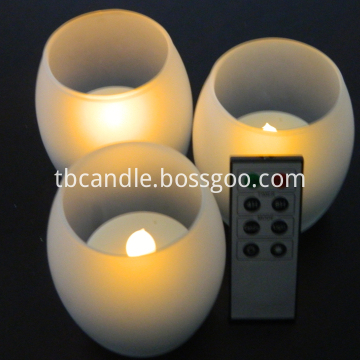 Battery operated candle in glass