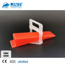 Floor tile leveling clips and wedges