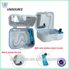Plastic denture case with mirror and denture brush