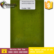 green transparent stained glass with bubbles