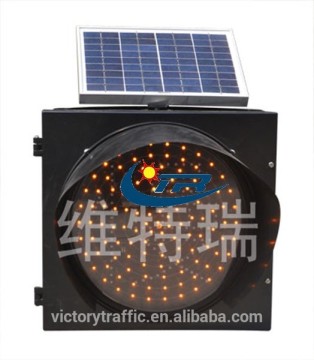 Solar powered flashing warning traffic light, amber blinker