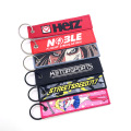 Anpassad anime Jet KeyChain Tyg Woven Tag Keychain