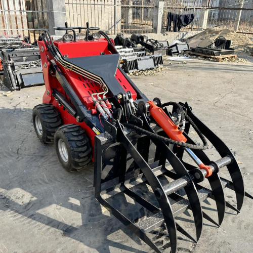 Skid steer loader mini skid steer dengan lampiran