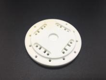 Machining of alumina ceramic components with micropores