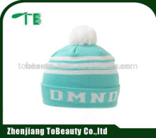 light green hat with white ball
